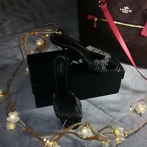 Beautiful and dainty Coach 2 inch heel